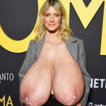 French actress Melanie Laurent exposing her driping tits