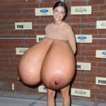 Me.Be, posing with her huge tits out in public