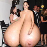 Sh.Wo. walking around people with her massive pendulous tits out
