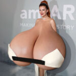 Skimpy Be.Th. flops her giant tits out in public