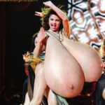 Se.Go. performing topless flopping her huge tits around