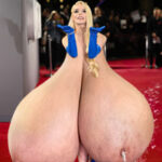 An.Ta.Jo. flopping her giant tits out and making a mess on the red carpet