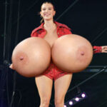 Mi.Bo.Br. flopping her huge round tits on stage