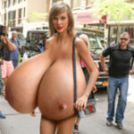 T.S. walking naked on the street bouncing her huge tits