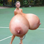 Je.Lo.He. naked in wedge heels trying to play tennis despite of her giant tits been on the way