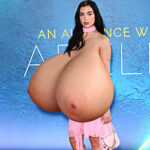 Dua.Li. in pink exposing her new huge round tits