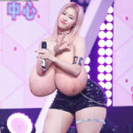 Korean singer Itzy Ryujin flopping her huge tits out on stage