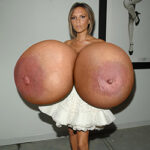 Vic.Bec. flopping her massive silicone tits out in public
