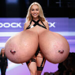 Em.Cl. exposing her giant tits on the runway