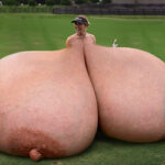 Mega busty golfer babe Gra.Cha. dragging her giant tits on the field