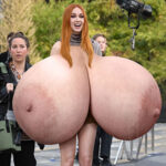 Ka.Gi. exposing her giant round tits in public