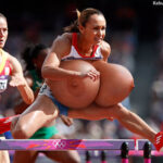 Jessica E flopping her tits put while running a hurdle race