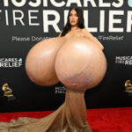 Ma.Be. exposing her giant silicone tits out in public