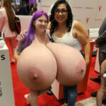 Demora Avarice exposing her huge tits in a convention