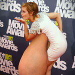 E.W. flopping her huge hanging tits out in public