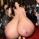 Co.Sm. flopping around her massive pendulous naked tits