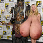 El.Fa. shows up naked exposing her huge tits for the Predator ComicCon show