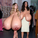 Sy.Sw. and Emily R. walking their naked huge tits out in public