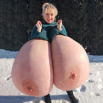 Abbi Secraa exposing her giant tits out in the snow