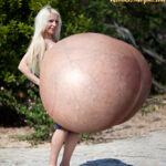 Beshine is about to break her back with her giant silicone tits