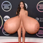 Ol.Ro. shows up naked exposing her huge tits to the music awards