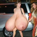 T.S. naked in public flopping her huge tits around