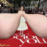 Em.Cl. dragging her giant tits to the premiere