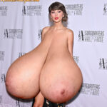 T.S. flopping her huge heavy tits out in public