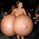 Ma.Ro. naked in heels bouncing her giant silicone tits in public