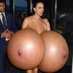 Marg.Qual. showing off her new giant silicone tits