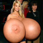 Jessica S. exposing her huge fake tits in public