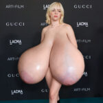 B. Eilish naked in socks exposing her massive tits in public