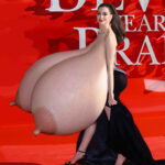 An.Ha. walking her giant naked tits on the red carpet